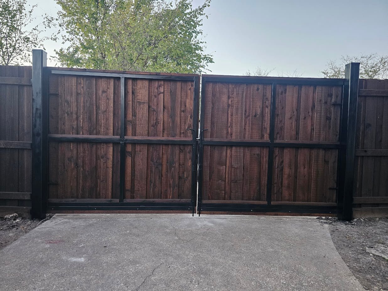 Decorative swing gate securing a property entrance